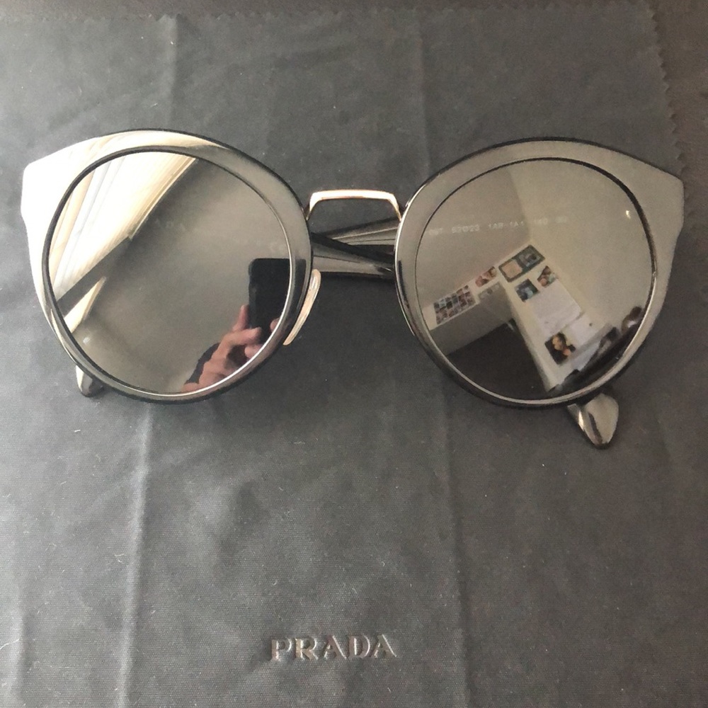 Prada Sunglasses -has light wear/very light scratches